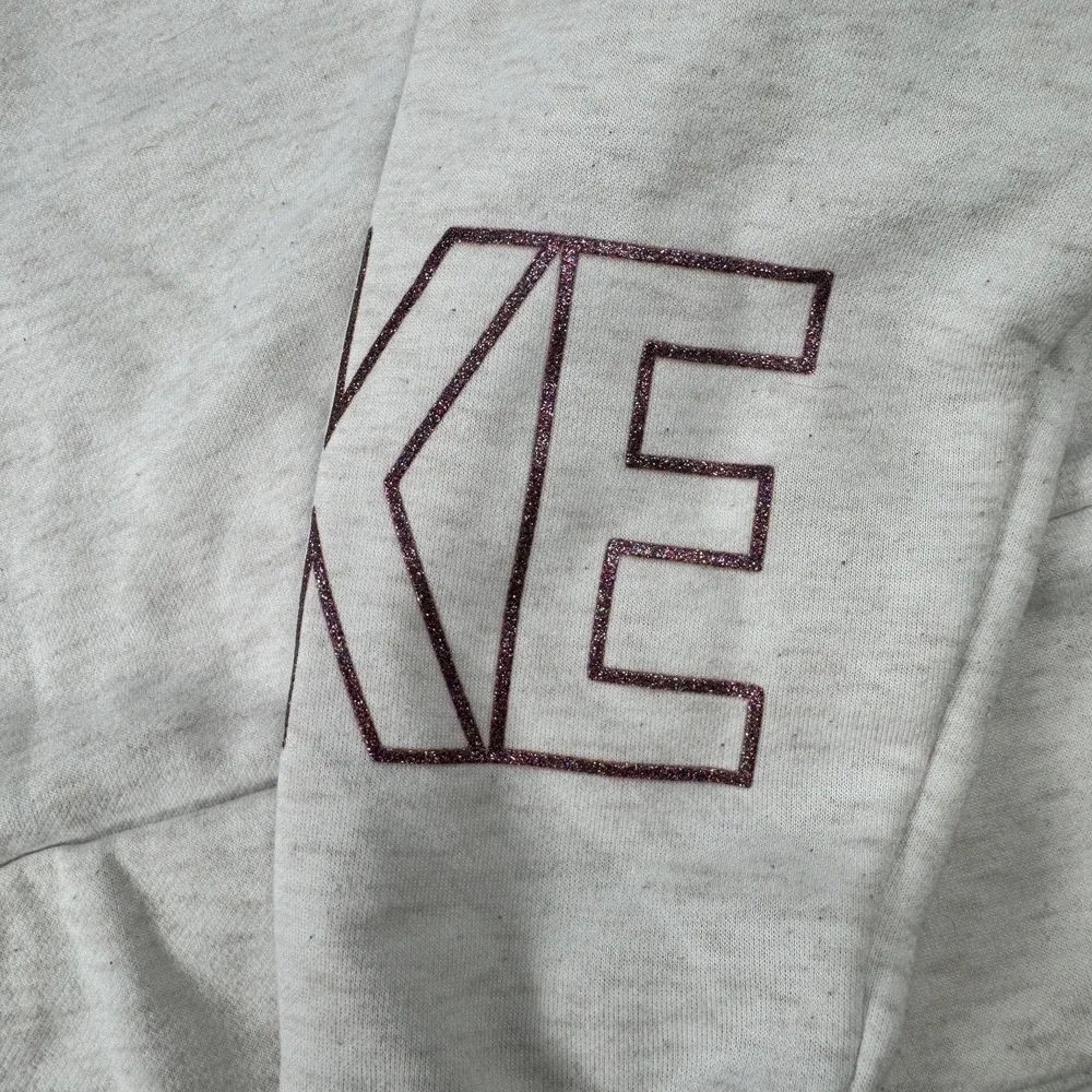 Nike Dri-FIT Pullover Womens Small Gray Glitter Swoosh Spell Out Logo Sleeve